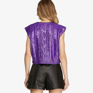 Purple metallic cropped cable knit sweater with structured shoulders and high-shine finish.