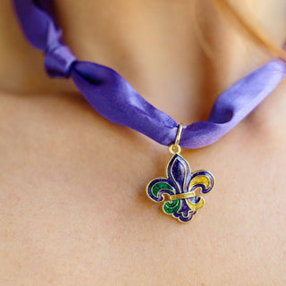 Purple Mardi Gras scarf necklaces with gold tone fleur-de-lis charm worn styled on model