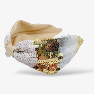 Beige knotted headband covered in white, gold, and silver sequins for a sparkling, elegant accessory perfect for parties or festive occasions.