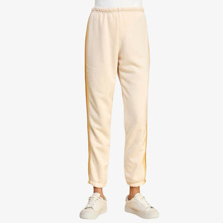Cream sweat pant with multi-color side stripes and elastic cuffs
