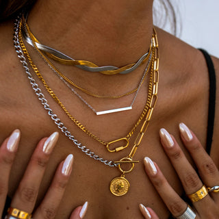 Water resistant gold layered necklace with clasp detail for vacation jewelry and daily outfits close-up view