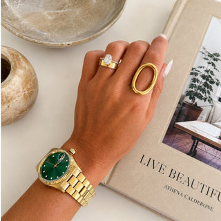 Amanda gold statement ring with oversized open oval design worn on hand lifestyle view