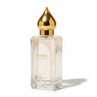 nemat amber eau de parfum perfume gold cap clear glass bottle angled view