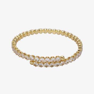 Material: Gold-plated brass, cubic zirconia
Size: One size fits most (adjustable stretch)