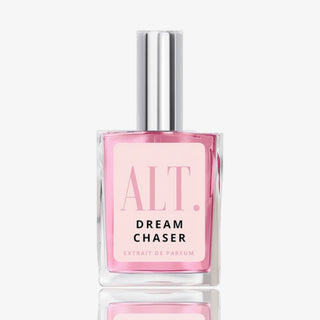 ALT. Dream Chaser Extrait de Parfum in a clear rectangular glass bottle with a silver cap and soft pink label.