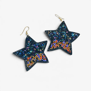 Black beaded star earrings featuring iridescent blue beads and colorful orange, purple, and gold seed bead accents with gold-tone fishhook ear wires, front view.