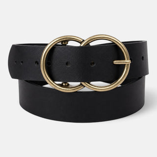 Chic Ring Leather Belt in black with antique gold double-ring buckle, coiled product view on a light background