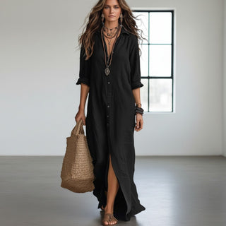 Black maxi shirt dress with button front, collared neckline and rolled sleeves front view
