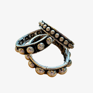 Modern silver dome stretch bracelet with polished rounded beads worn on wrist