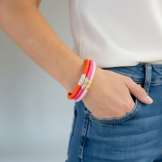 BudhaGirl Valentina Three Kings pink bangles worn by model on a white background