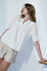 Melissa Nepton Candice white blouse with embroidered tiny flowers, a v-neck and pleated bodice and sleeve, perfect for spring 2024