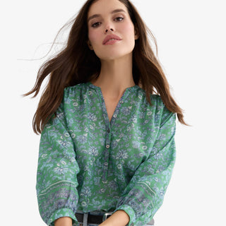 Green floral popover blouse with long sleeves and button neckline front view