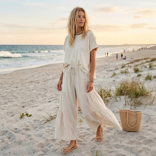 Linen palazzo pants in oatmeal with elastic waist and tiered detail