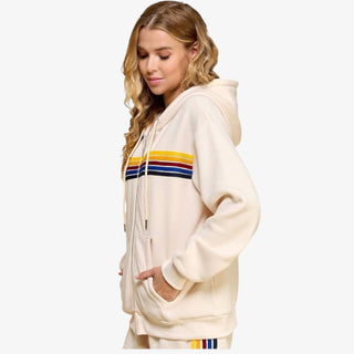 Cream sweat pant with multi-color side stripes and elastic cuffs