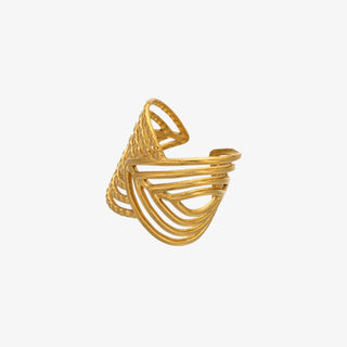 Gold openwork ring on a white background