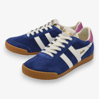 Gola Elan deep blue suede sneaker with white stripe detail, pink heel tab, gum sole, and lace-up design shown from angled front view