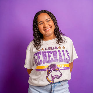 Person wearing a 'LSUA Generals' t-shirt with a purple background