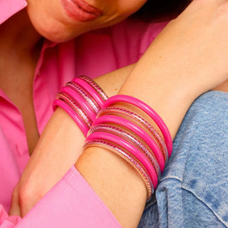 BudhaGirl Three Queens all weather bangles in epic pink featuring crystal detail and mixed metallic center accents