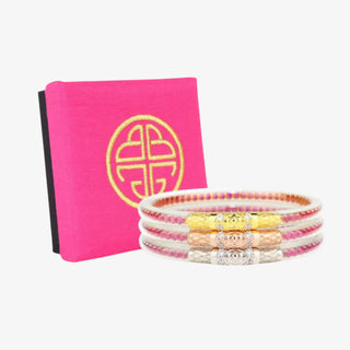 BudhaGirl Three Queens all weather bangles in epic pink featuring crystal detail and mixed metallic center accents