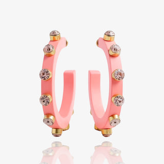 Resin hoop earrings with gold rhinestone accents in pink