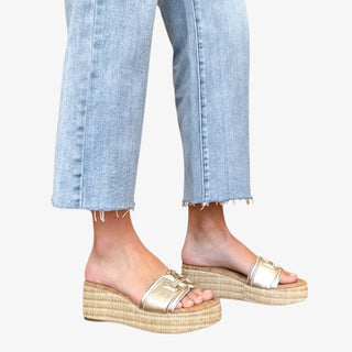 Woman wearing jeans and Sam Edelman Pauleena Espadrille Sandal with gold strap