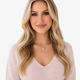 Freshwater pearl necklace with delicate 18K gold-plated chain worn on model for an elegant everyday jewelry look