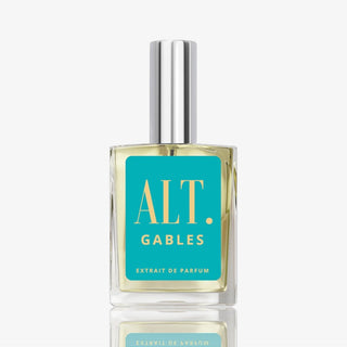 Alt Gables Perfume bottle with teal label and silver cap on a white background