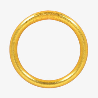 Gold BudhaGirl bangle on a white background