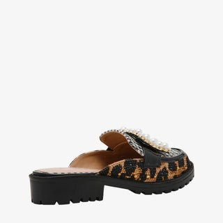 Betsey Johnson Grayce Mule in leopard with pearl buckle and crystal embellishments, a bold statement loafer with chunky black lug sole.