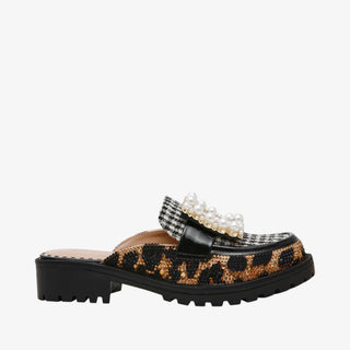 Leopard print mule with embellishments on a white background