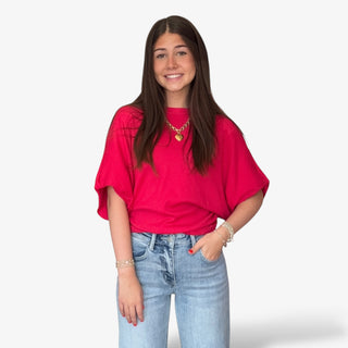 Michael Stars Vicky Top with balloon sleeves and a fitted bodice in the color poppy. 