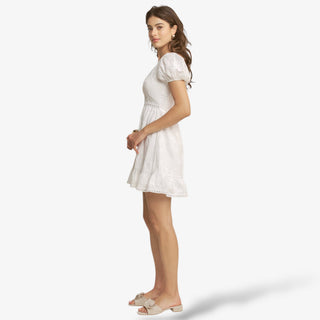 White lace mini dress eyelet puff sleeve bridal shower outfit front view