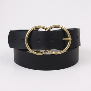Black belt with a gold double ring buckle on a white background