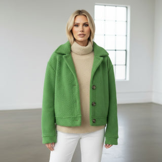Green boucle cropped jacket front view with oversized collar and textured fabric styling detail