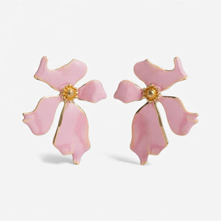 Pink flower-shaped earrings with gold accents on a white background