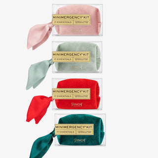 Four 'Minimergency Kit' packages with colorful scarves on a white background