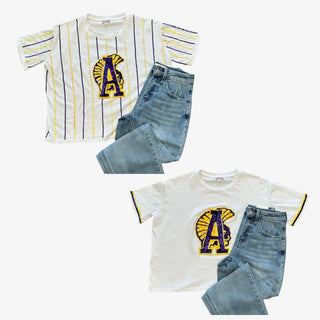 Two outfits featuring Alexandria Senior High School t-shirts with the trojans mascot, paired with jeans on a white background