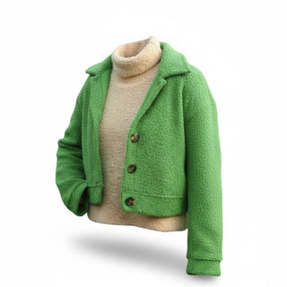 Green jacket with beige turtleneck on a white background