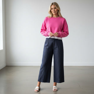 Michael Stars April wide leg trouser in nocturnal blue with cropped wide leg silhouette, front seam detail, side pockets, and relaxed fit shown on model front view