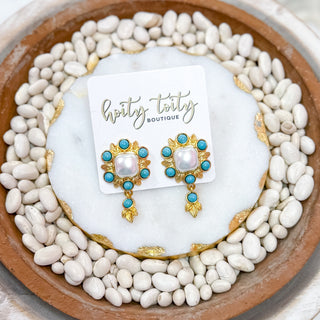 Boho Bloom gold earrings with pearl center and turquoise stone accents displayed on Hoity Toity Boutique card.