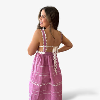 Back view of pink scallop trim midi dress with white ric-rac detail, and scalloped straps  perfect for Easter, spring events, and vacation outfits.