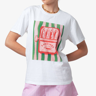 Person wearing a white t-shirt with a graphic design of sardine can and striped pattern.