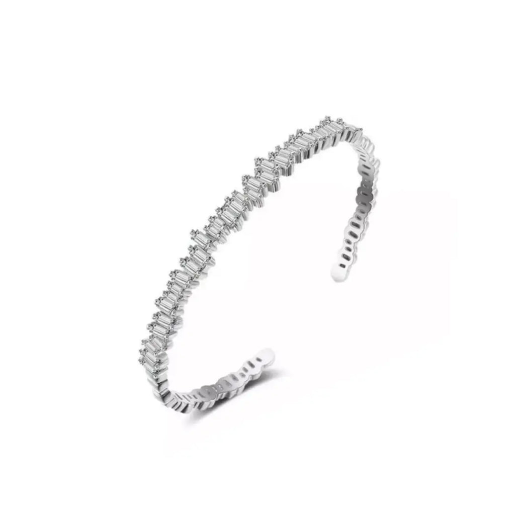 Discover style in our silver Ice Baguette Cuff Bracelet. Featuring CZ diamonds and a comfortable fit made for adjusting. Shop Now!
