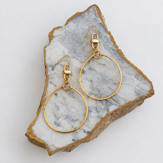 Kitzi Lola gold hoop earrings with oversized open hoops, decorative gold link details and fishhook ear wires, front product view