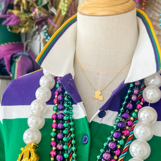 Mannequin wearing a colorful Mardi Gras shirt with beads and a Louisiana pendent  necklace.