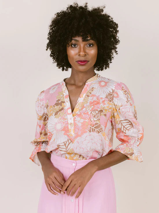 Betsy Blouse in palm beach floral with v-neck and elastic sleeve cuff.