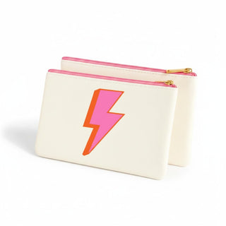 Lightning bolt cosmetic bag with cream vegan leather and pink zipper angled product view
