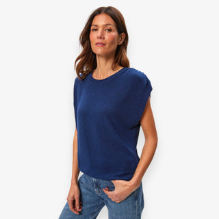 Michael Stars Sharon shirred bubble top in nocturnal blue with cap sleeves, relaxed drape, and soft lightweight fabric styled with denim for an elevated casual look