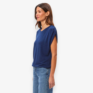 Side view of Michael Stars Sharon shirred bubble top in nocturnal blue with soft lightweight fabric and cap sleeves