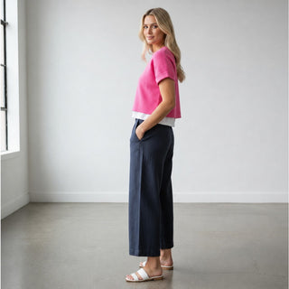 Wide leg navy herringbone linen pants in Nocturnal side view showing relaxed wide leg fit